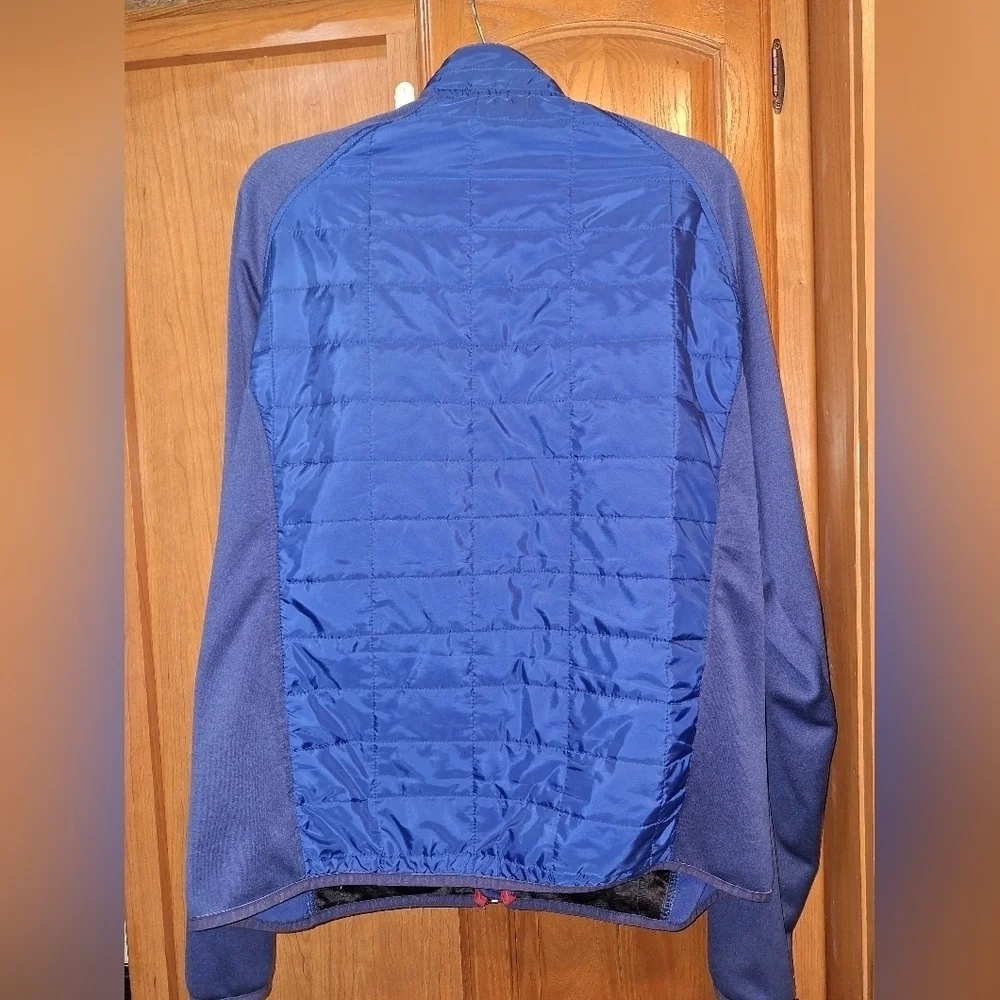 An Orvis blue quilted bodice jacket in a Men's size XL